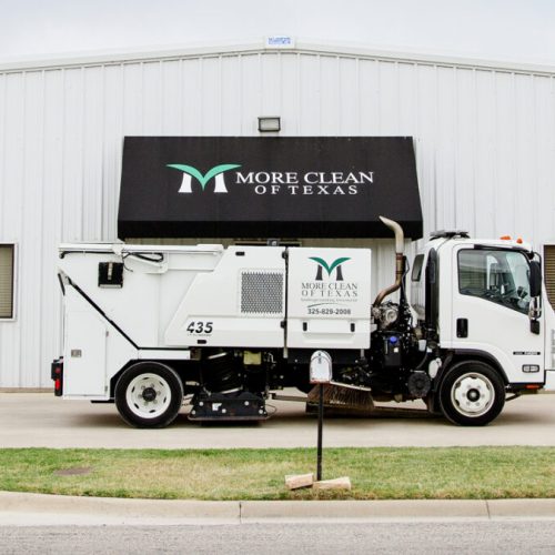 More Clean of Texas Sweeping Truck in front of More Clean of Texas